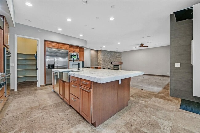 Building Photo - Fully Upgraded 5 Bedroom 4.5 Bathroom in Guard Gated Foothills Community!