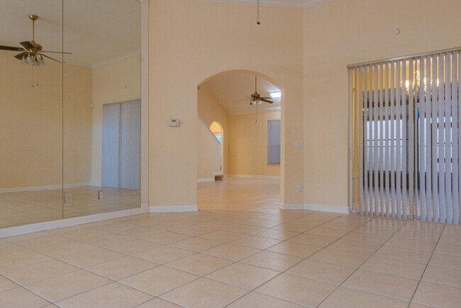 Building Photo - Spacious 5BR Home in Falcon Trace | 3-Car Garage | Screened Patio | Resort-Style Amenities Rent: ...