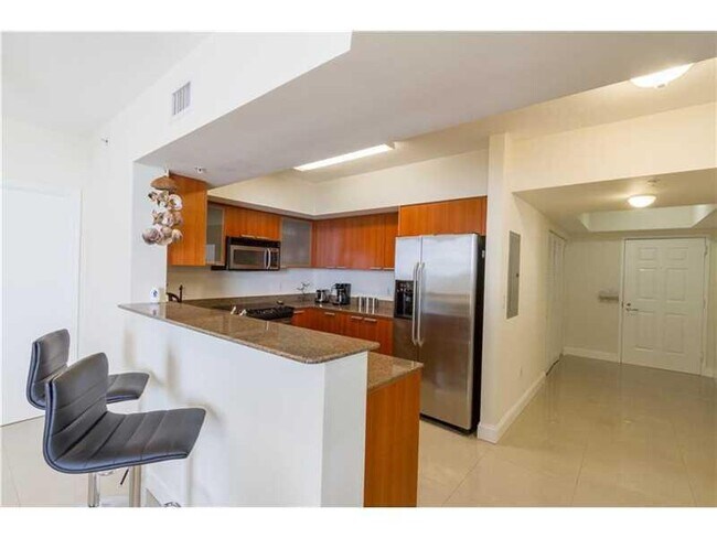 Building Photo - 16699 Collins Ave