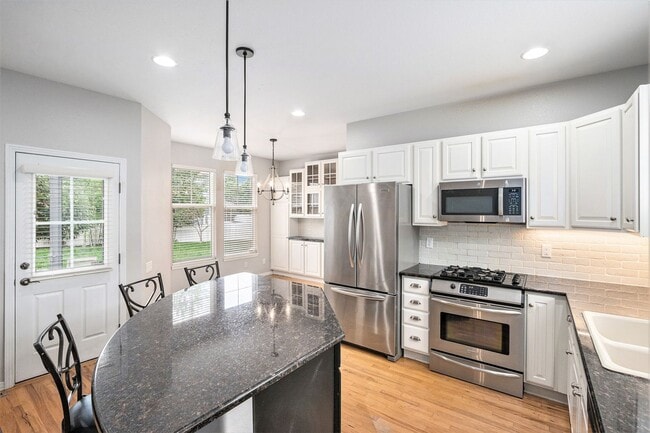 Building Photo - Welcome to this beautifully maintained 4-bedroom, 4-bath home with a dedicated office space