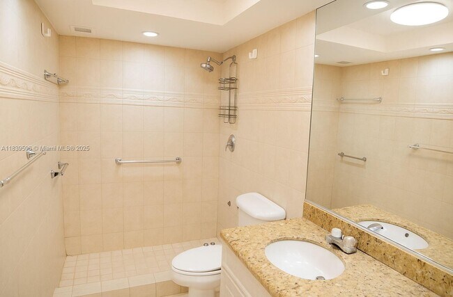 Building Photo - 5005 Collins Ave