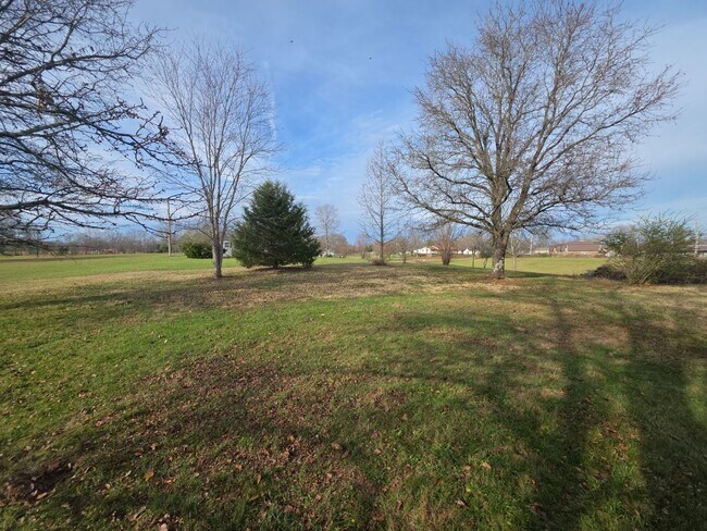 Building Photo - 2-Bedroom Handicap-Accessible Home with 3-Season Porch, Garage, and Large Yard