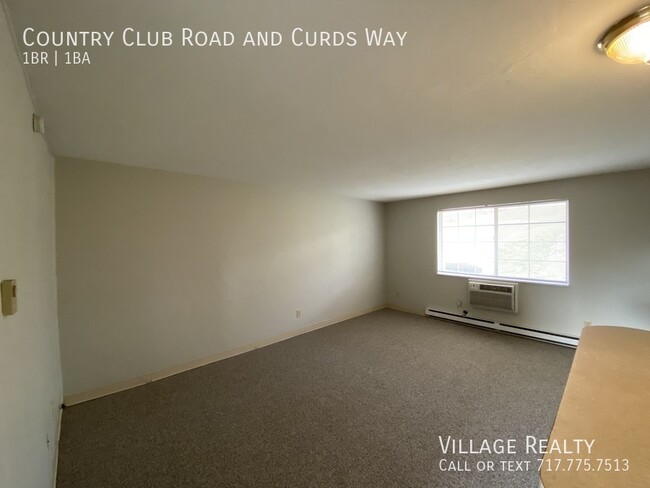 Building Photo - End unit! Cozy countryside 1-bed w/ on-sit...