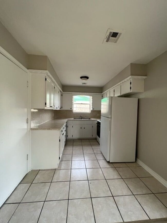 Building Photo - 130 NE Fullerton- COMING SOON!