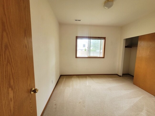 Building Photo - Charming Split-level 4 Bedroom Home - E Mc...