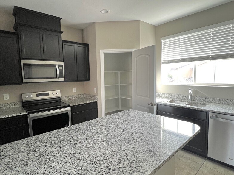 2nd floor kitchen with large storage room - 1255 N Arizona Ave