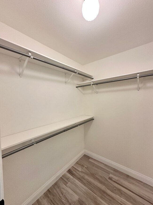 Building Photo - Corner Unit Two Story Townhome in the Beau...