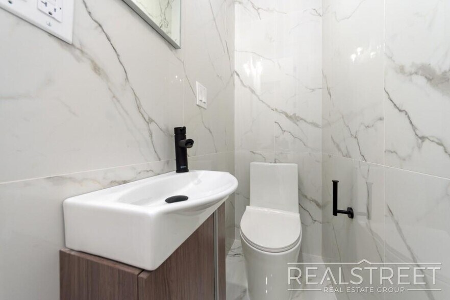 Building Photo - Brand New 4 Bed, 2 Bath with In-Unit Laundry, Private Balcony & Central Air