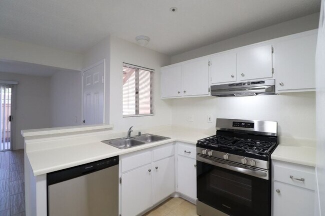 Building Photo - Cozy Condo with Private Patio & Resort-Style Amenities