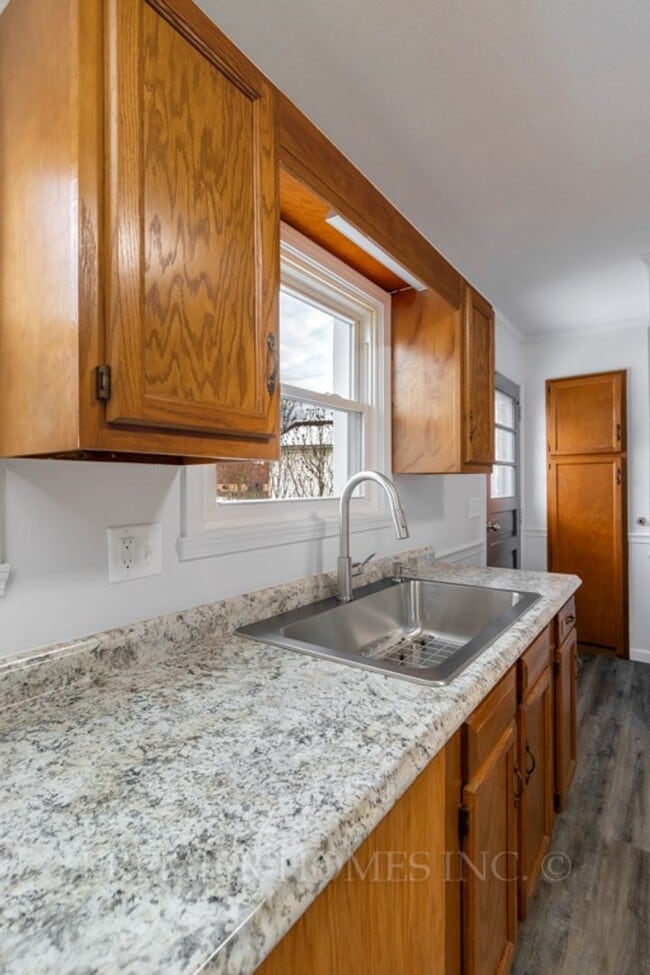 Building Photo - 3812 Root Ave NE