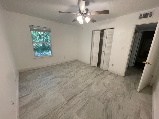 Building Photo - 6831 Tiki Ln