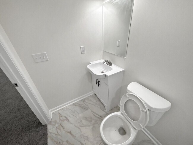 Building Photo - Spacious 3BR Home with Finished Basement & Flex Space