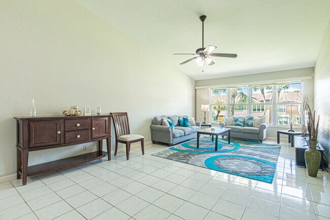 Building Photo - Fully Furnished Naples Condo with Resort-Style Living