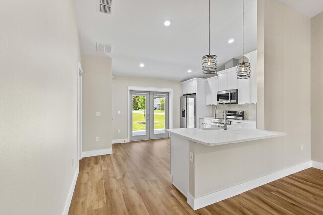 Building Photo - Modern Living Awaits!