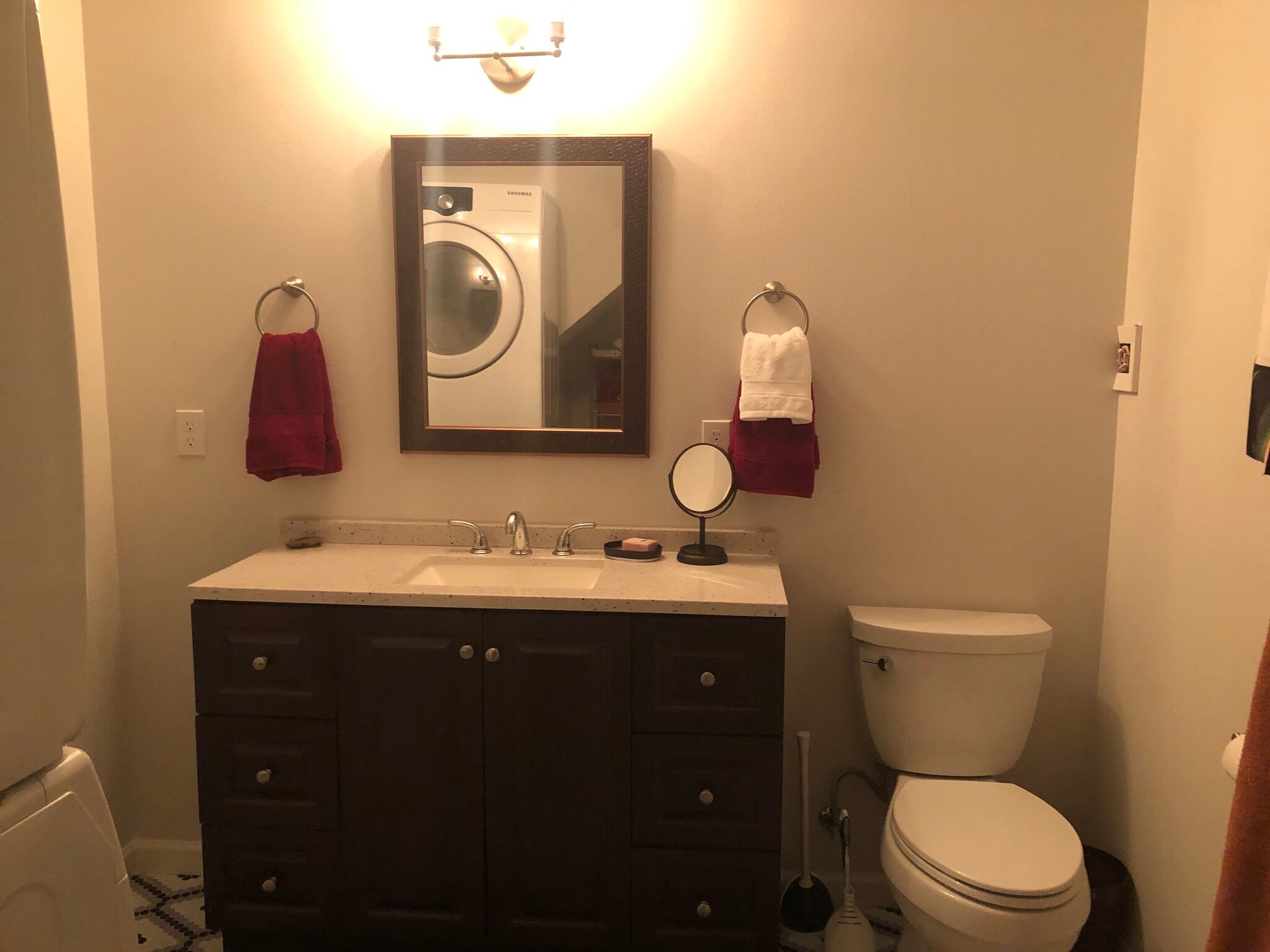 Full bathroom with tiled shower/bathtub and private washer/dryer - 25609 Lawson St