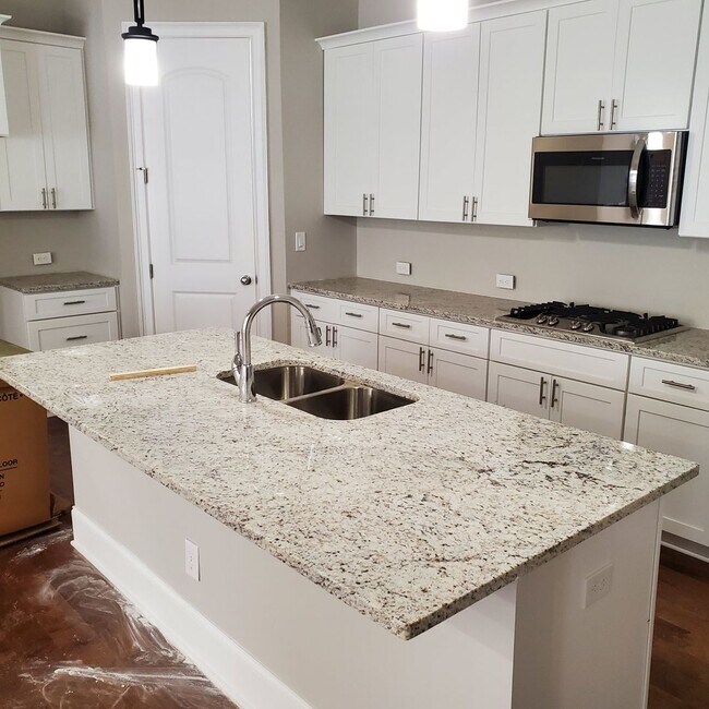 Building Photo - COMING SOON! Stunning New Home in Prime Mi...