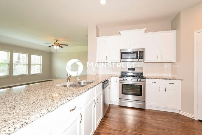 Building Photo - 4 Bedroom Pet-Friendly Home in FATE, TX with Main Street Renewal