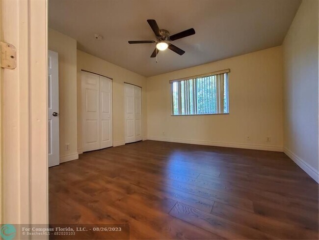 Building Photo - 7661 Tamarac Island Cir