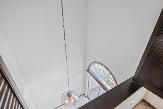 Building Photo - COMING SOON - Spacious 2-Bed, 3.5-Bath Townhouse with Stunning Lake Views