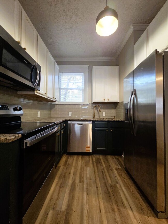 Building Photo - Renovated stately brick home in Forest Hill area on large lot.