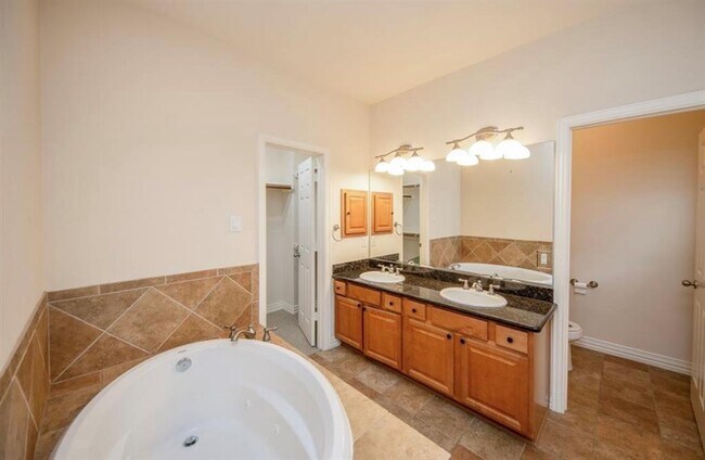 Building Photo - 7103 Windwater Lagoon Dr