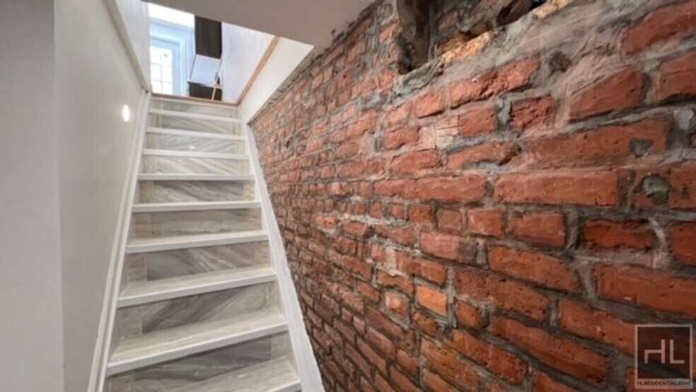 Building Photo - 100% GUT RENOVATED DUPLEX  with PRIVATE GA...