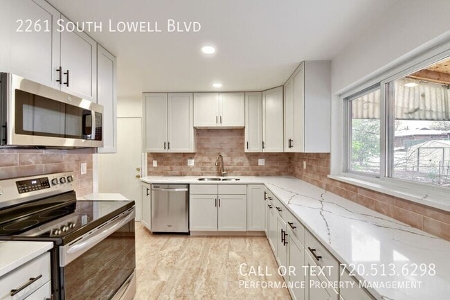 Building Photo - 2261 S Lowell Blvd