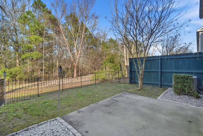 Building Photo - Charming 3 Bedroom Townhome with Private Patio & Fenced Backyard