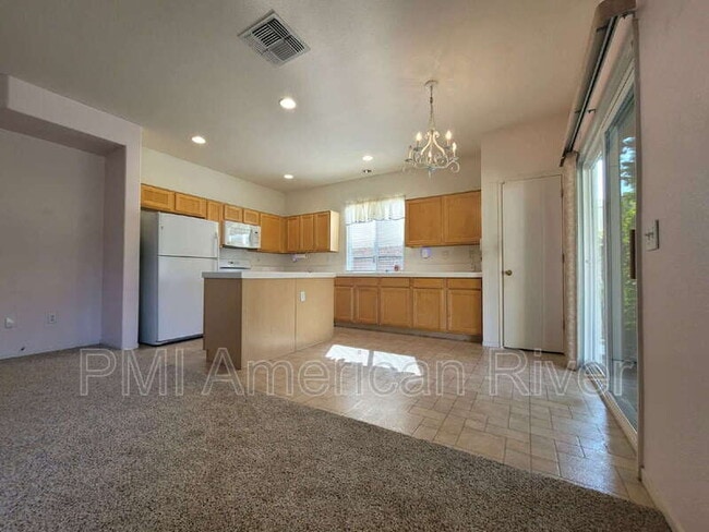 Building Photo - 8440 Zinnia Way