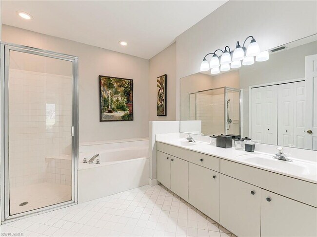 Building Photo - Turnkey 2-bedroom plus den villa, perfectly situated to capture stunning golf course and lake vie...