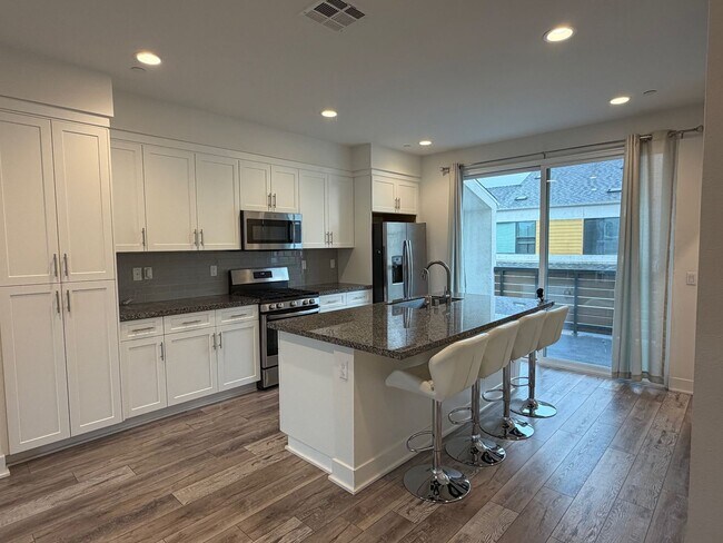 Building Photo - Smart, Modern 4-Bedroom Townhome Near Disneyland & Major Freeways