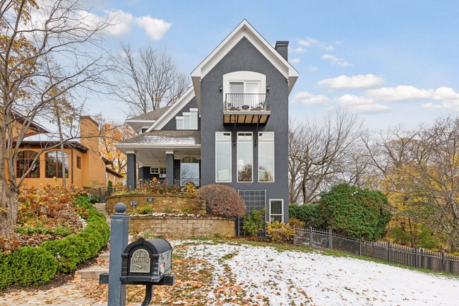 This unique house was built in 2002. - 745 Rice St E