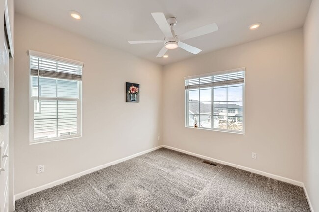 Building Photo - Evolve Real Estate: Available Immediately! Almost NEW Large 3 Bedroom in STERLING RANCH!