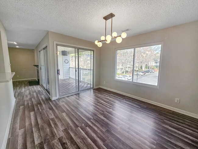 Building Photo - Stylish 2-Bedroom, 2-Bath End-Unit Condo i...