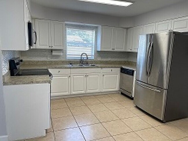 Building Photo - AUGUST MOVE IN FOR THIS RANCH STYLE HOME I...