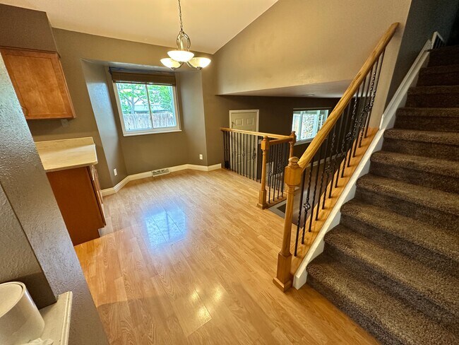 Eat-in kitchen nook overlooking the spacious family room - 7393 S Washington Cir