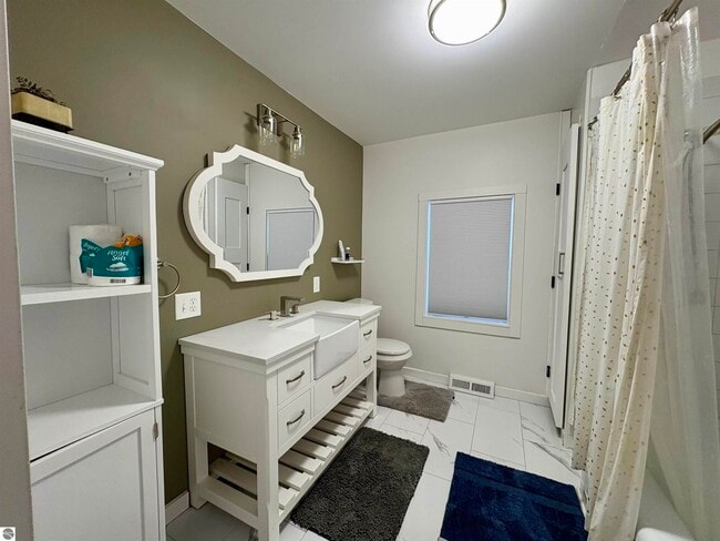 Building Photo - 7638 Skegemog Point Rd