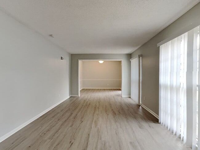 Building Photo - Spacious 4BR Home with Finished Basement, Fireplace & Unique Layout