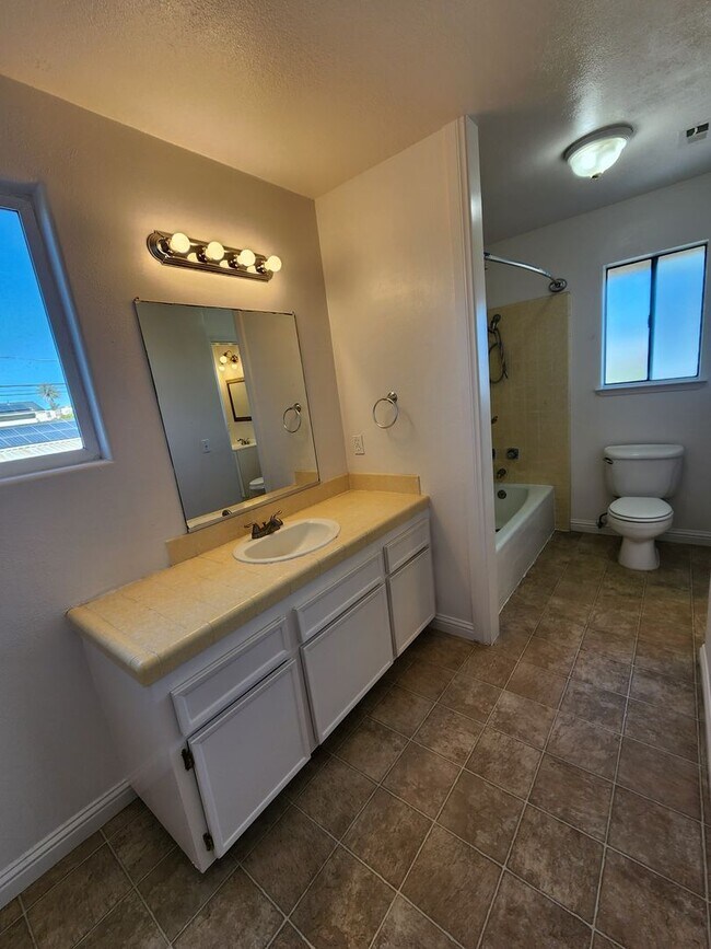 Building Photo - Bright Two-Story 3BR Home Near the Beach with Private Yard