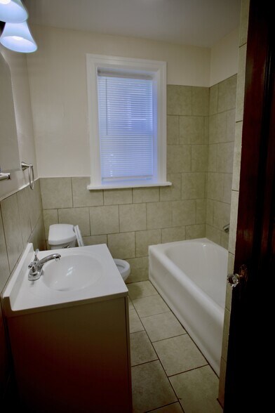 Building Photo - 3927 Dunnica Ave