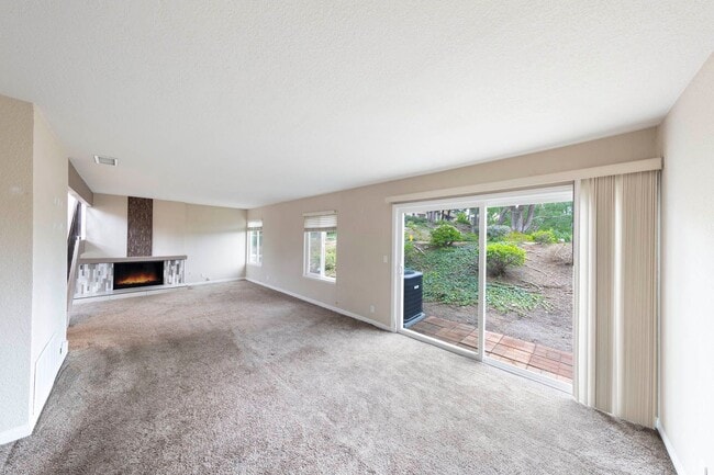 Building Photo - Fully renovated 2 bedroom 2 car garage Townhome