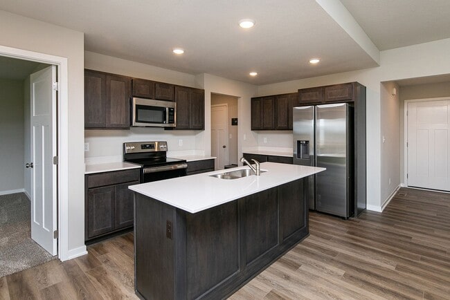 Building Photo - "Rare Find: Spacious Ranch Living at Its Best in Bondurant with the lowest rent ever"