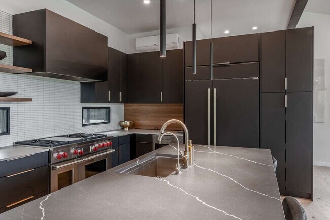 Building Photo - Modern Luxury Rental with Unobstructed Fla...