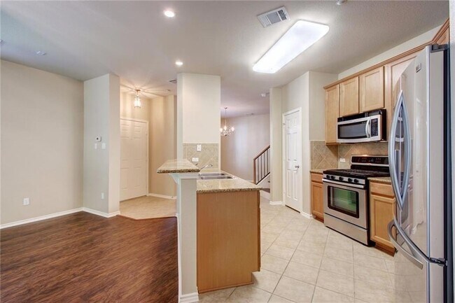 Building Photo - 1310 W Parmer Ln