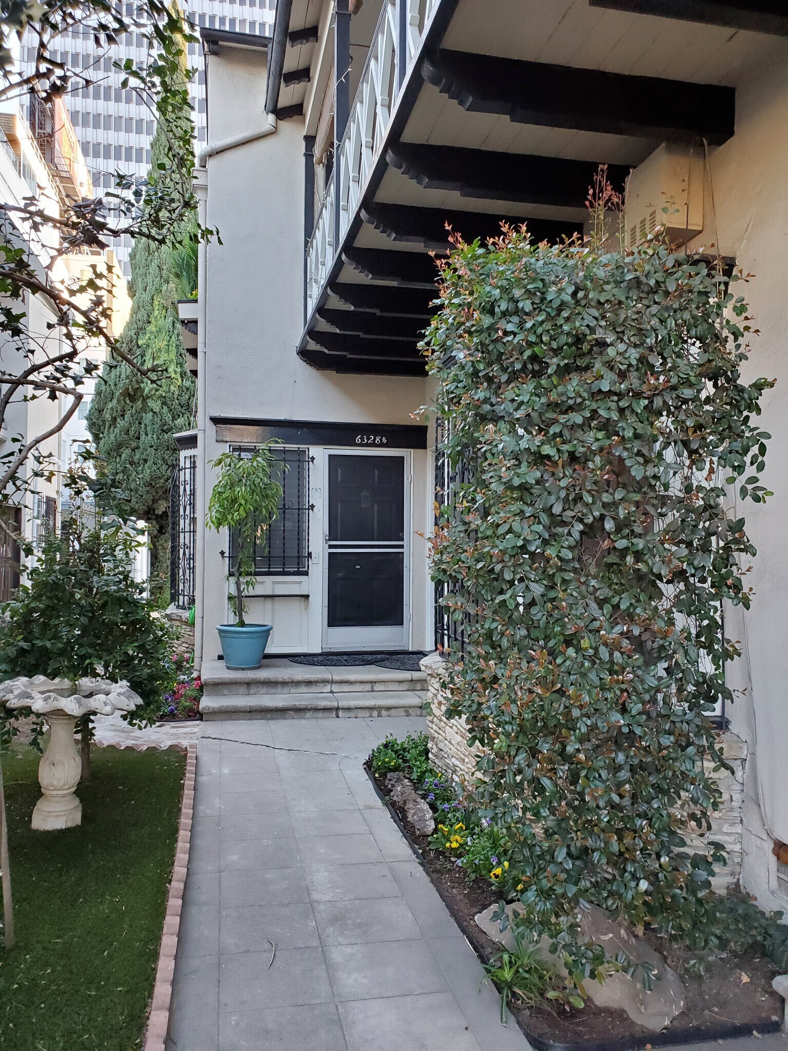PATHWAY WITH BIRDBATH AND BIRD FEEDER - 6328 Orange St