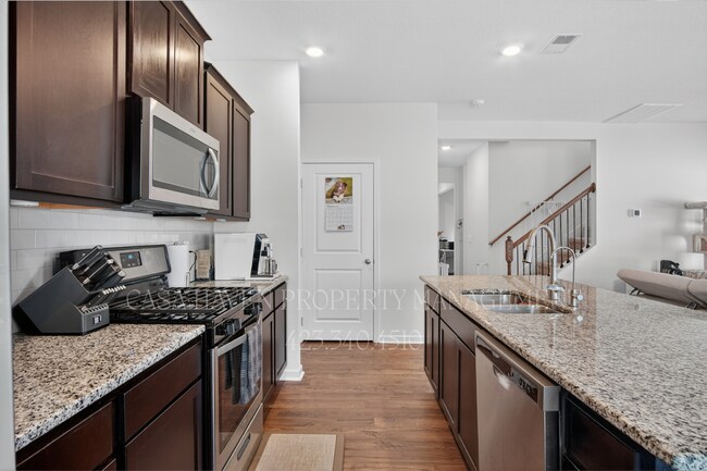 Building Photo - Coming Soon | Welcome to The Meadows Community | Where Modern Living Meets Space, Style, and Comfort