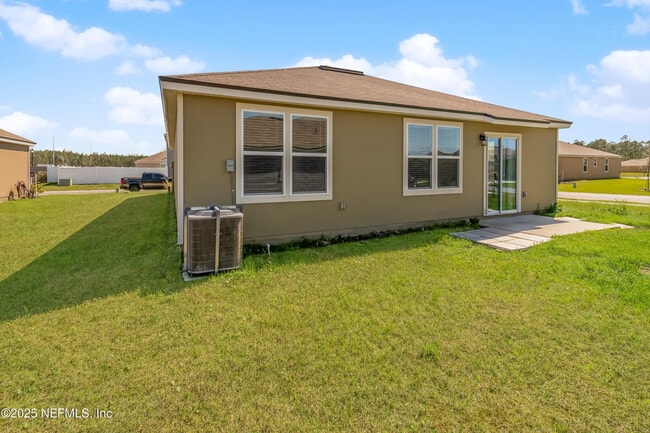 Building Photo - 15697 Saddled Charger Dr