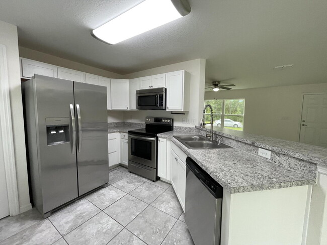 Building Photo - Move-In Ready! Beautiful 3BR/2BA with New Flooring & Fresh Paint