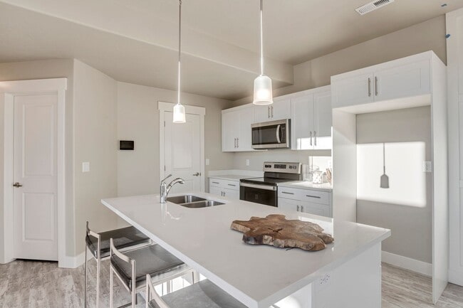 Building Photo - Come take a look at this End unit in the Fields