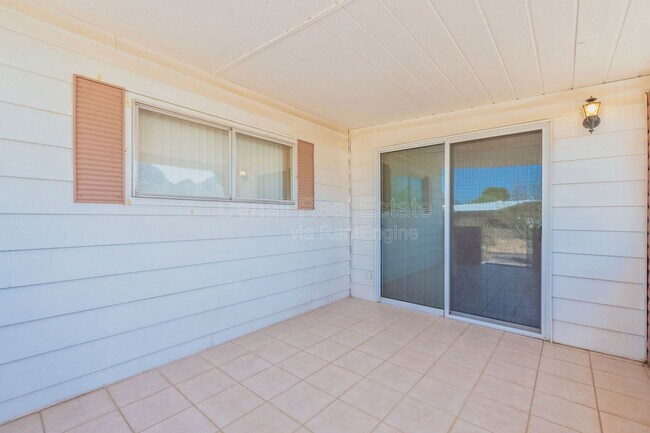 Building Photo - 10675 N Kilimanjaro Ave